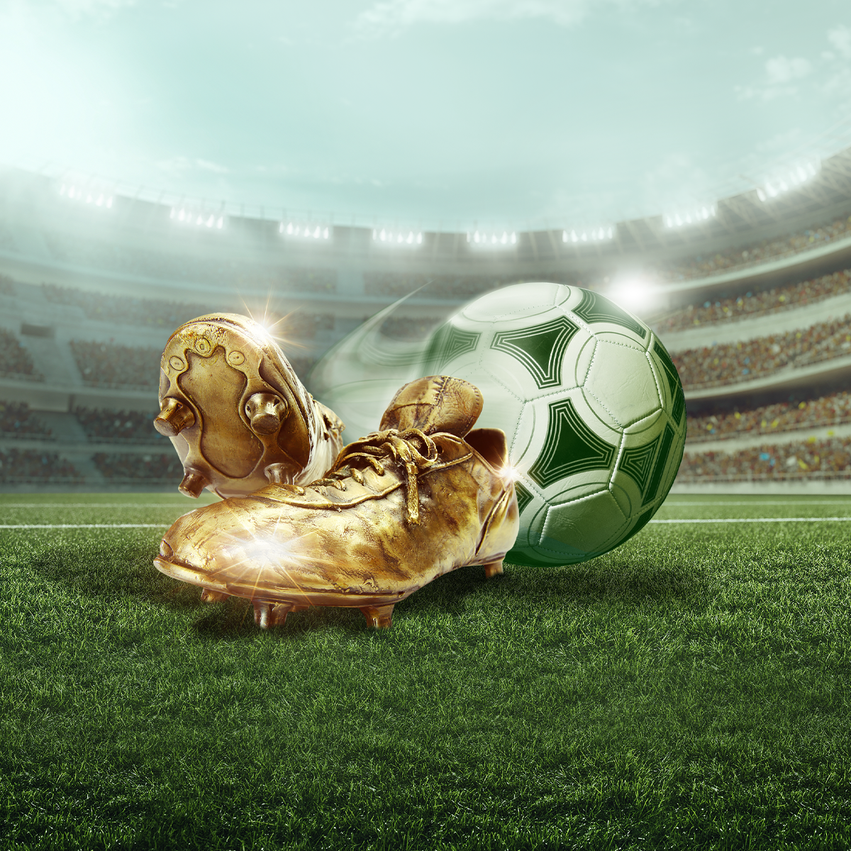 Goldene Fu&szlig;ballschuhe und Ball im Stadion.